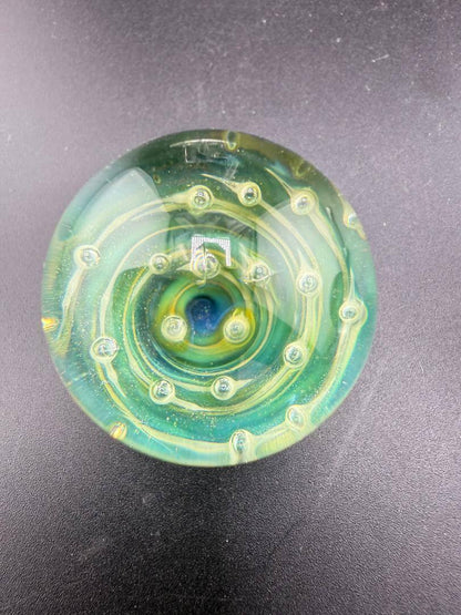 Danny W Glass Marble - 32mm Green Bubble Trap / Implosion showcasing vibrant green spiral design.