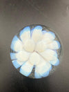 Danny W Glass Marble - 33mm White Implosion showcasing a handcrafted design with white and blue details.