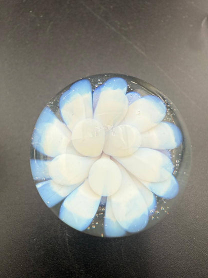 Danny W Glass Marble - 33mm White Implosion showcasing a handcrafted design with white and blue details.