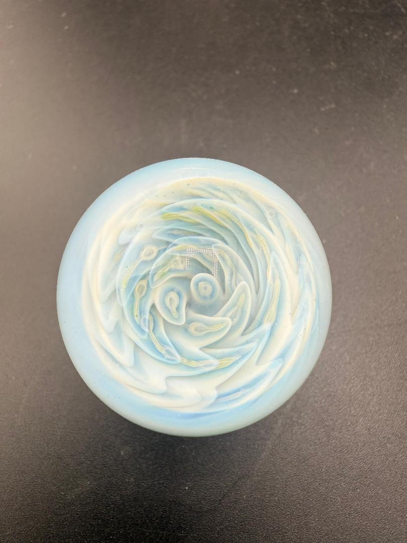 Danny W Glass Marble - 33mm White Implosion showcasing a beautiful white implosion design crafted in Spokane.