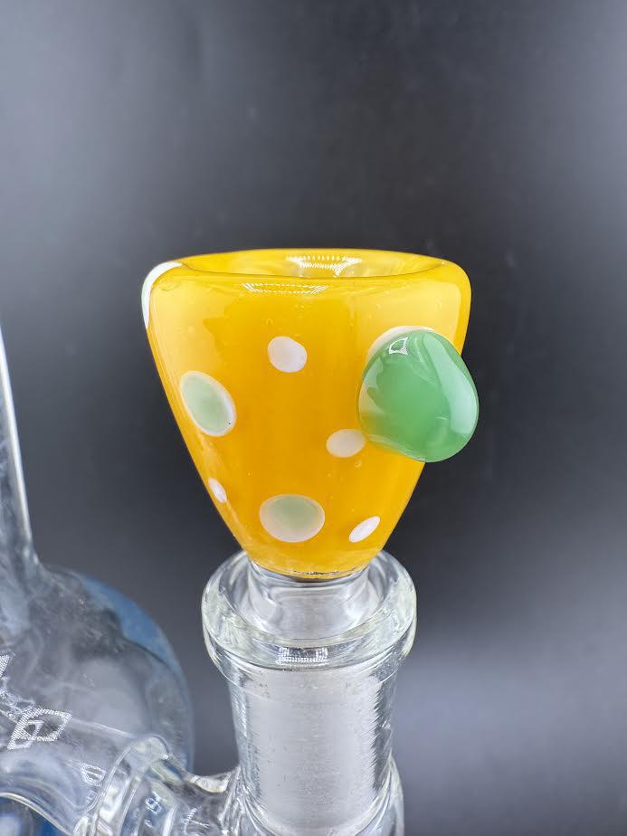 Polka dot 14mm bowl with yellow base and green accents, perfect for enhancing your glassware collection.