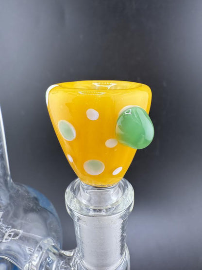 Polka dot 14mm bowl with yellow base and green accents, perfect for enhancing your glassware collection.