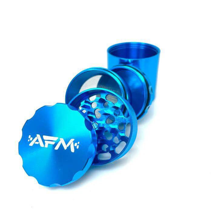 AFM 5pc Grinder in blue, featuring a magnetic lid and diamond-shaped teeth for smooth, fine grinding.