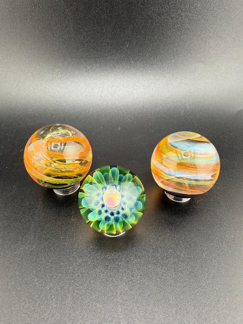 Doc Glass Fumed Marble 1" Marble - Handcrafted glass art showcasing vibrant colors and intricate designs.