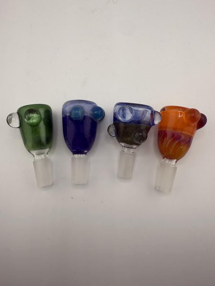Four colorful glass bowl pieces in various designs and colors, showcasing unique artistic flamework.
