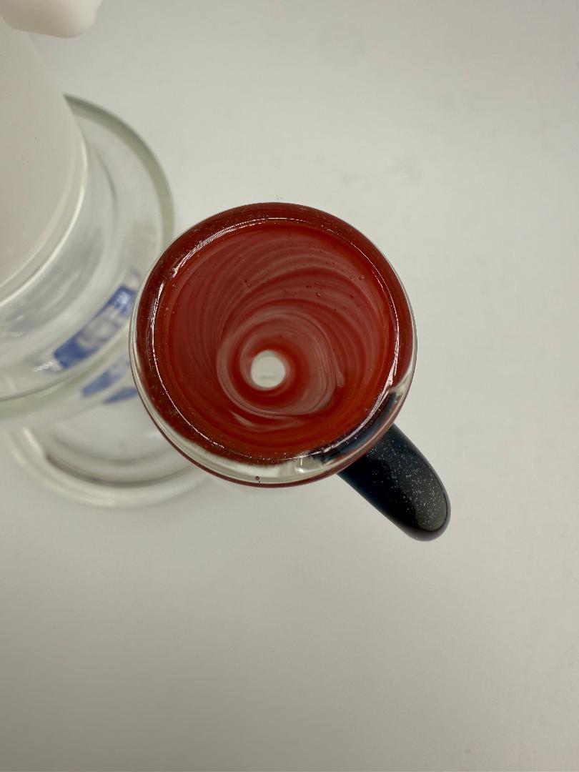 Top view of a red and white swirled Lylo Glass Single Hole Martini Bowl for smooth airflow and easy cleaning.