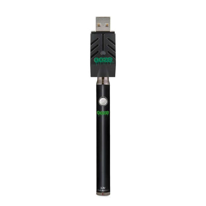 Sleek Ooze Twist Pen Slim vape battery with USB charger, compatible with 510 thread cartridges and wax attachments.