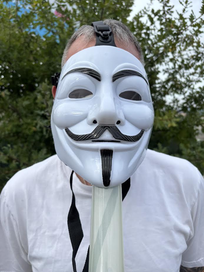 Person wearing a Gas Mask with Bong, showcasing a unique Halloween party accessory.