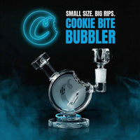 Cookie Bite Bubbler, a durable borosilicate glass pipe with a unique cookie bite design for smooth smoking.