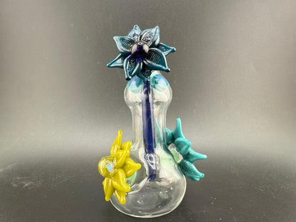 Pablos Glass Flower Jar featuring vibrant glass flowers in blue and yellow, perfect for decorative use.