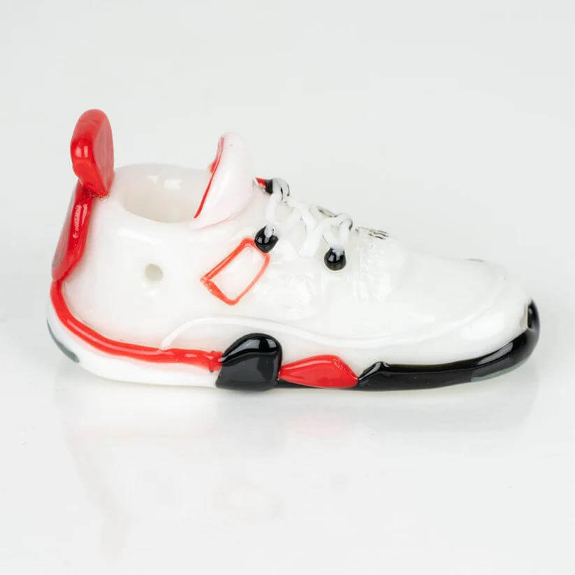 Retro Highz Volume 2 Hand Pipe in the shape of a stylish sneaker with red and black accents.