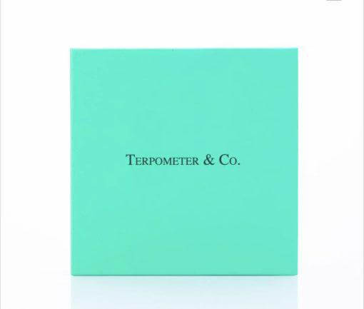 Terpometer IR thermometer packaging box in teal color with brand name Terpometer & Co.