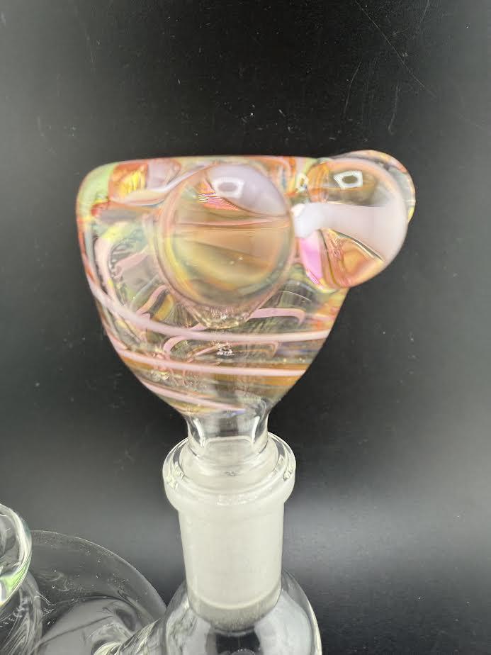 Close-up of Crondo Glass fumed bowl piece showcasing vibrant colors and intricate design, 14mm size.