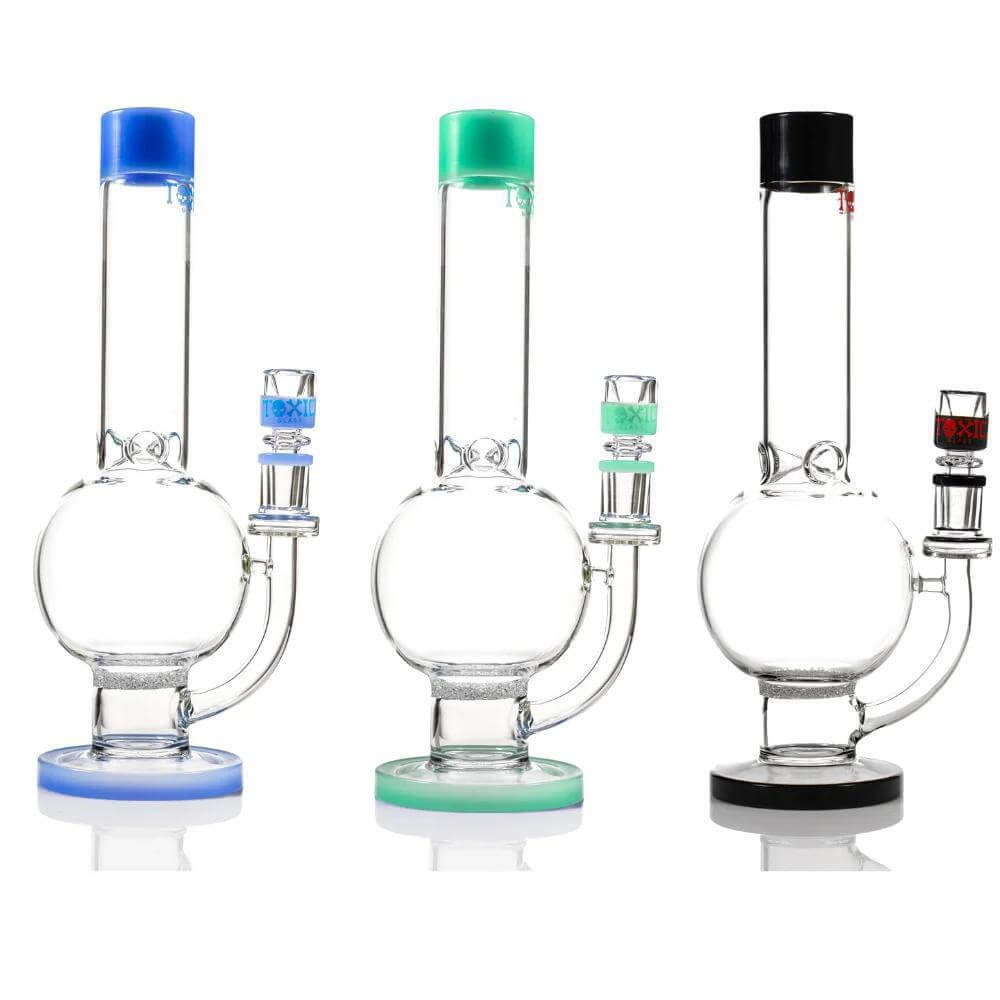 Toxic Glass Frit Perc 12" Globe in three colors: blue, green, and black, showcasing sleek design and durable glass.