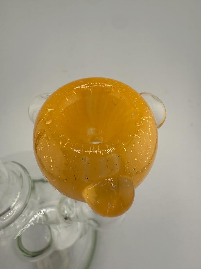 Top view of a vibrant orange 14mm borosilicate glass bowl piece for water pipes.