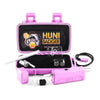 Huni Badger portable device in pink case with accessories, ideal for consuming herbal extracts on-the-go.