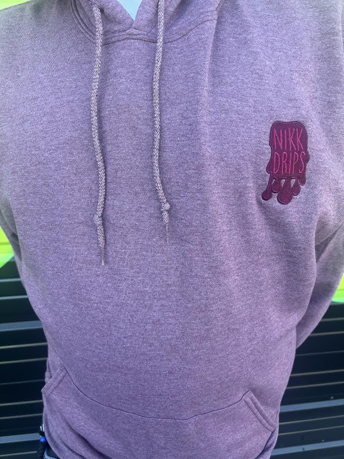 Nikk Drips Hoodie displayed on a mannequin showcasing its stylish design and comfortable fit.