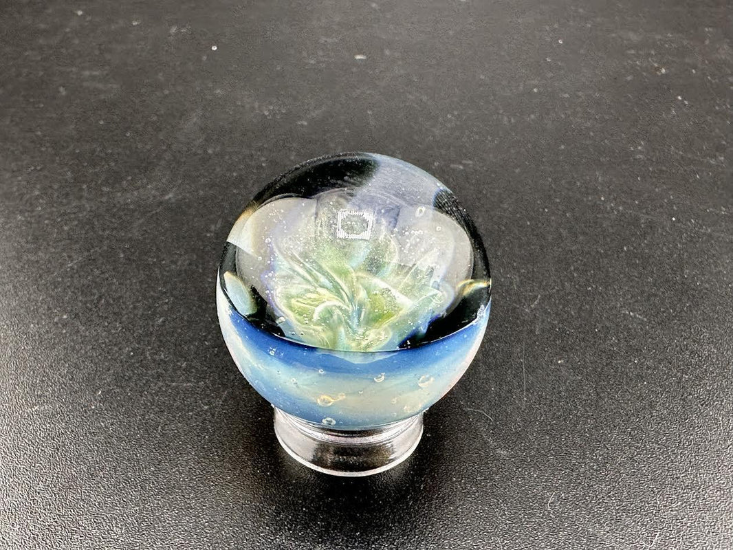 Elbow Tim Glass Fume Chaos Marble – Stunning handcrafted glass art marble, 1 inch, showcasing vibrant colors and patterns.