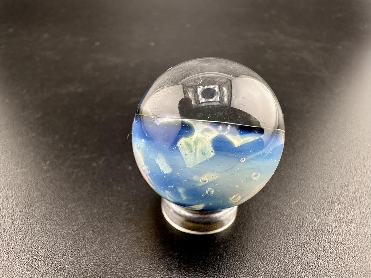 Elbow Tim Glass Fume Chaos Marble – handcrafted glass art marble with swirling colors and patterns.