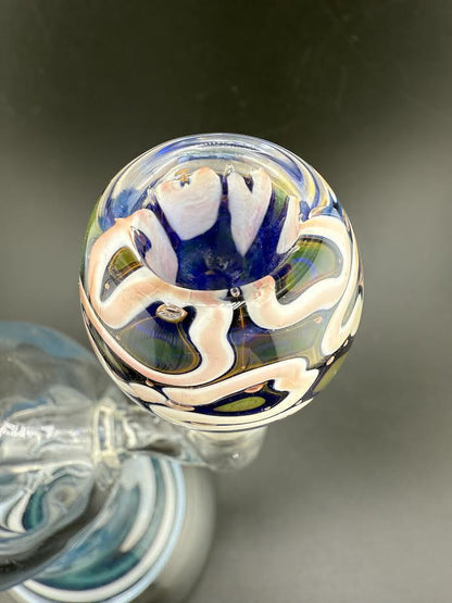 14mm blue gold fumed bowl with intricate swirling patterns, showcasing vibrant colors and smooth glass craftsmanship.