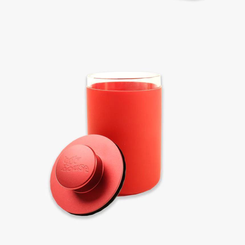 Ugly House Stash Air 9 oz red smell-proof storage container for herbs and snacks.