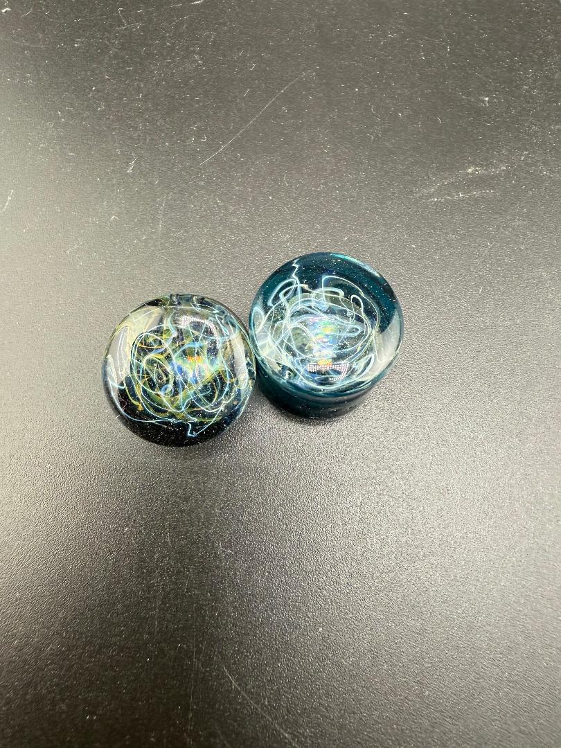 Mop Head Glass Gauges 15/16" showcasing unique swirl patterns in handcrafted artisan glass from Spokane, WA.