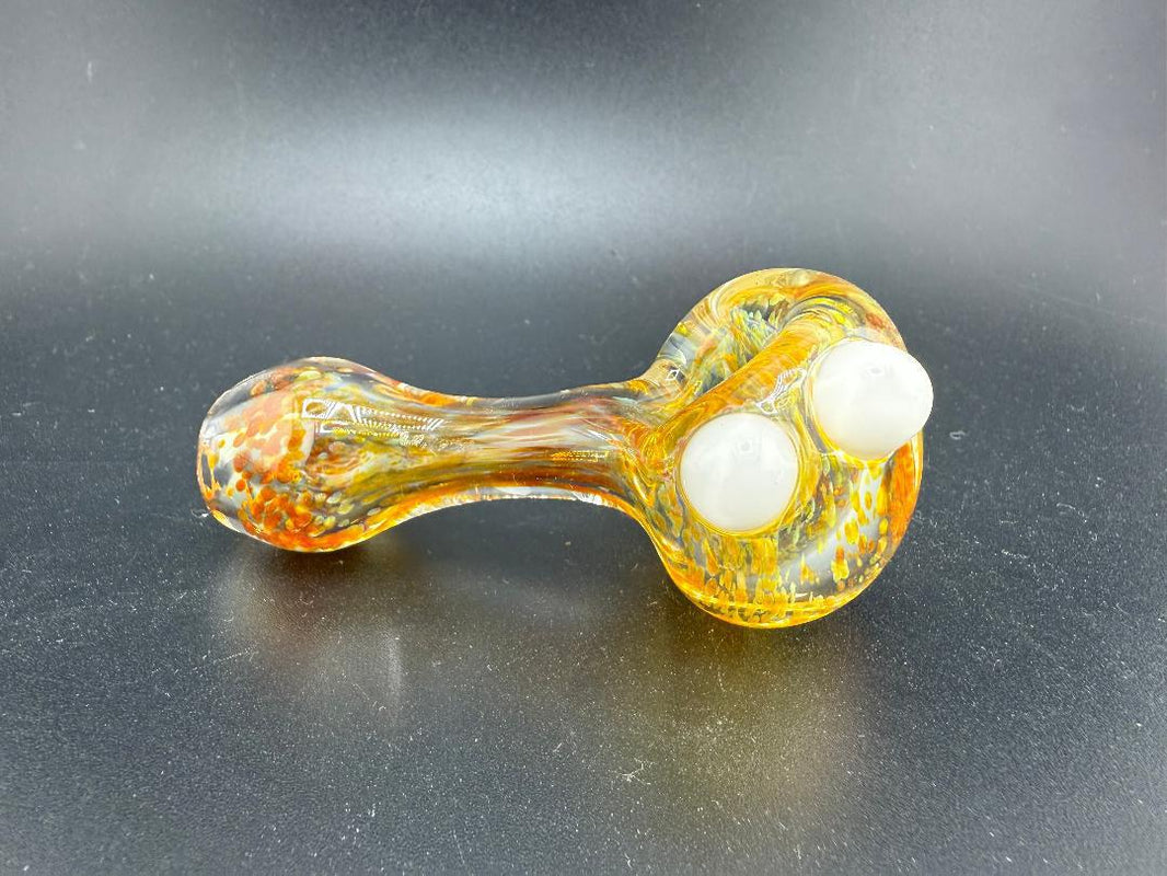 Elbow Tim Glass Fumed Frit Hand Pipe showcasing vibrant fumed finish and unique frit design, handcrafted in Spokane.