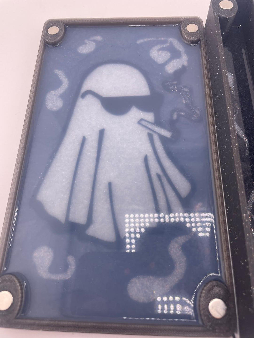 Dr Dabber Ghost 2 storage box featuring a ghost design with sunglasses and a smoking pipe.