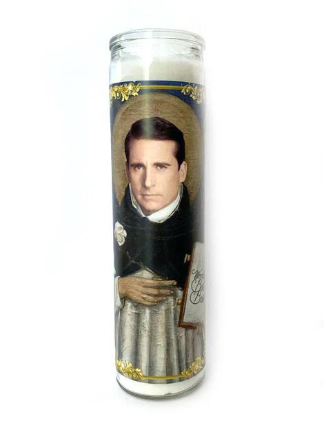 Bobbyk Saint Candles featuring a tall, white prayer candle with a parody portrait of a cultural icon.