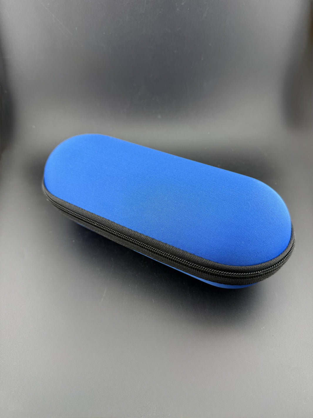 Pipe Case - Large in blue, padded protective capsule for larger glass pieces.
