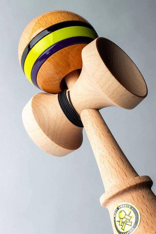 Sweets Kendama Legend Mod designed by Matt Jorgenson, featuring Beech ken and vibrant purple-yellow tama.