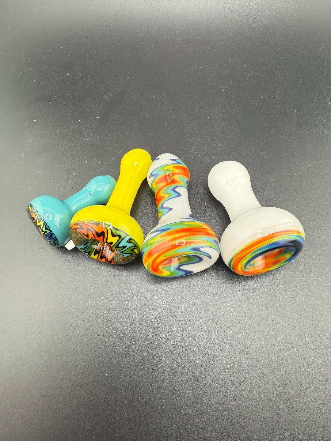Colorful handcrafted Mcdoogle Glass Chillums featuring unique designs and vibrant patterns.