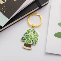 Occasionalish Keychain - Fiddle Leaf Fig enamel keychain with green fiddle-leaf fig design and gold keyring.