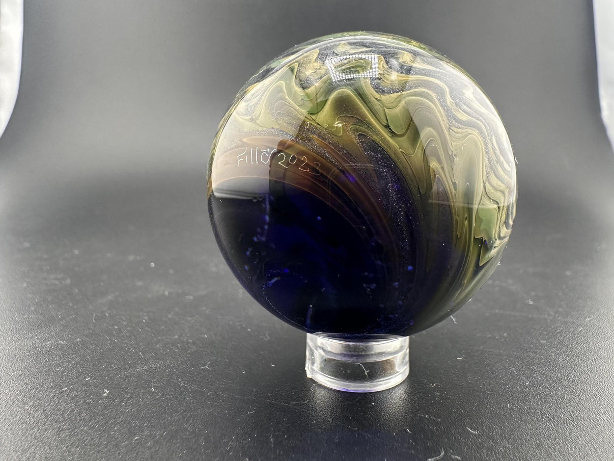 Filla John Glass Big Marble - Sparkled Swirls UV showcasing stunning sparkles and intricate swirling patterns.