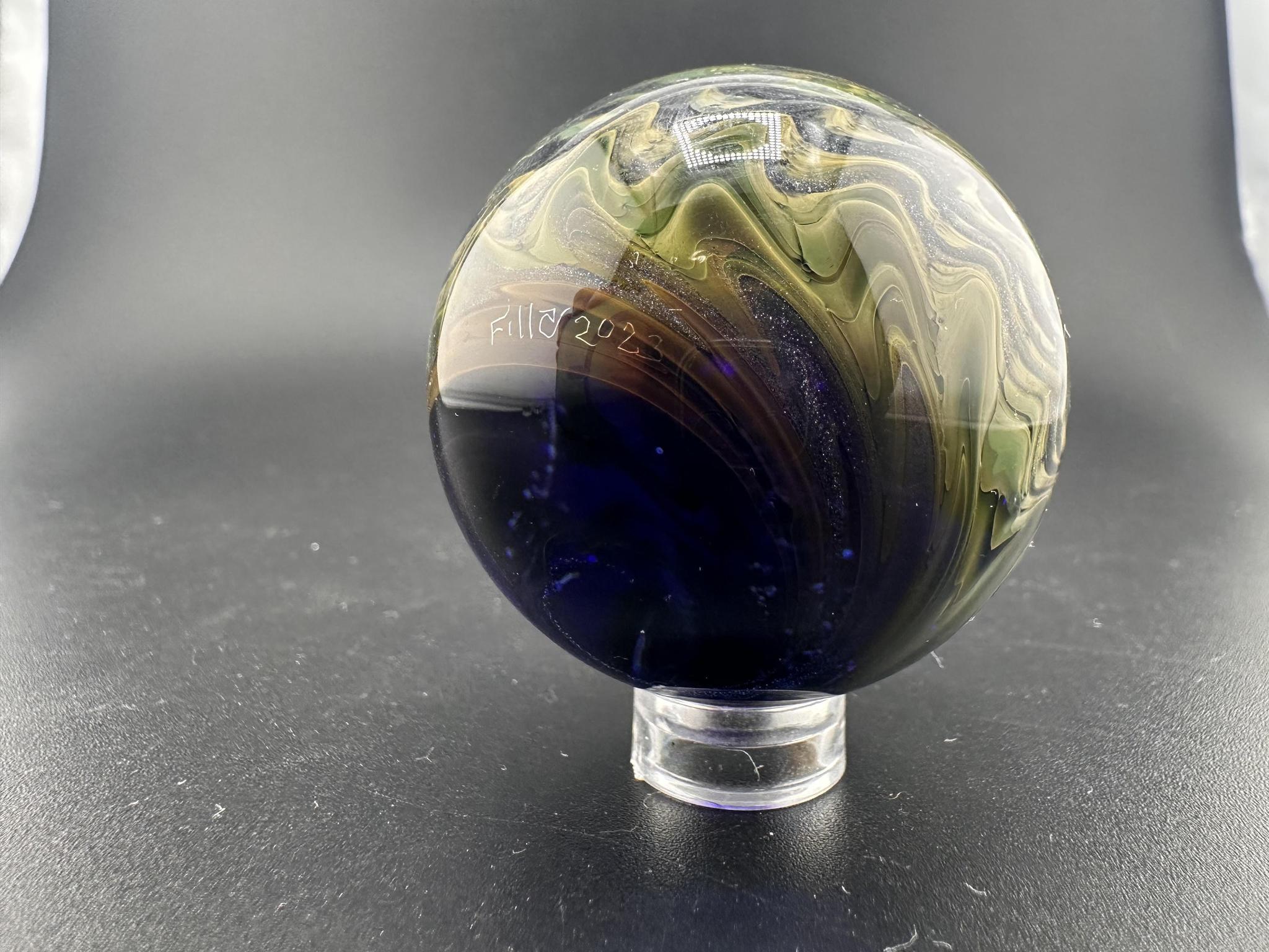Filla John Glass Big Marble - Sparkled Swirls UV showcasing stunning sparkles and intricate swirling patterns.