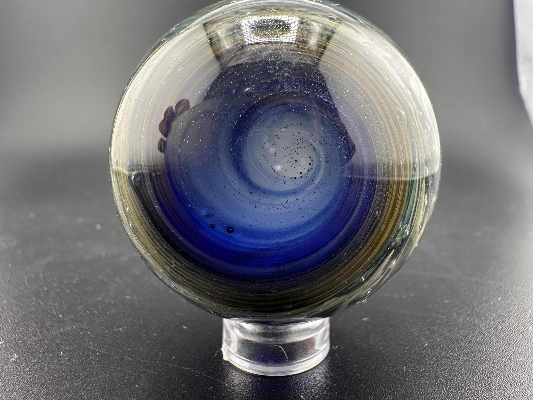 Filla John Glass Big Marble - Sparkled Swirls UV showcasing intricate swirling patterns and UV-reactive elements.