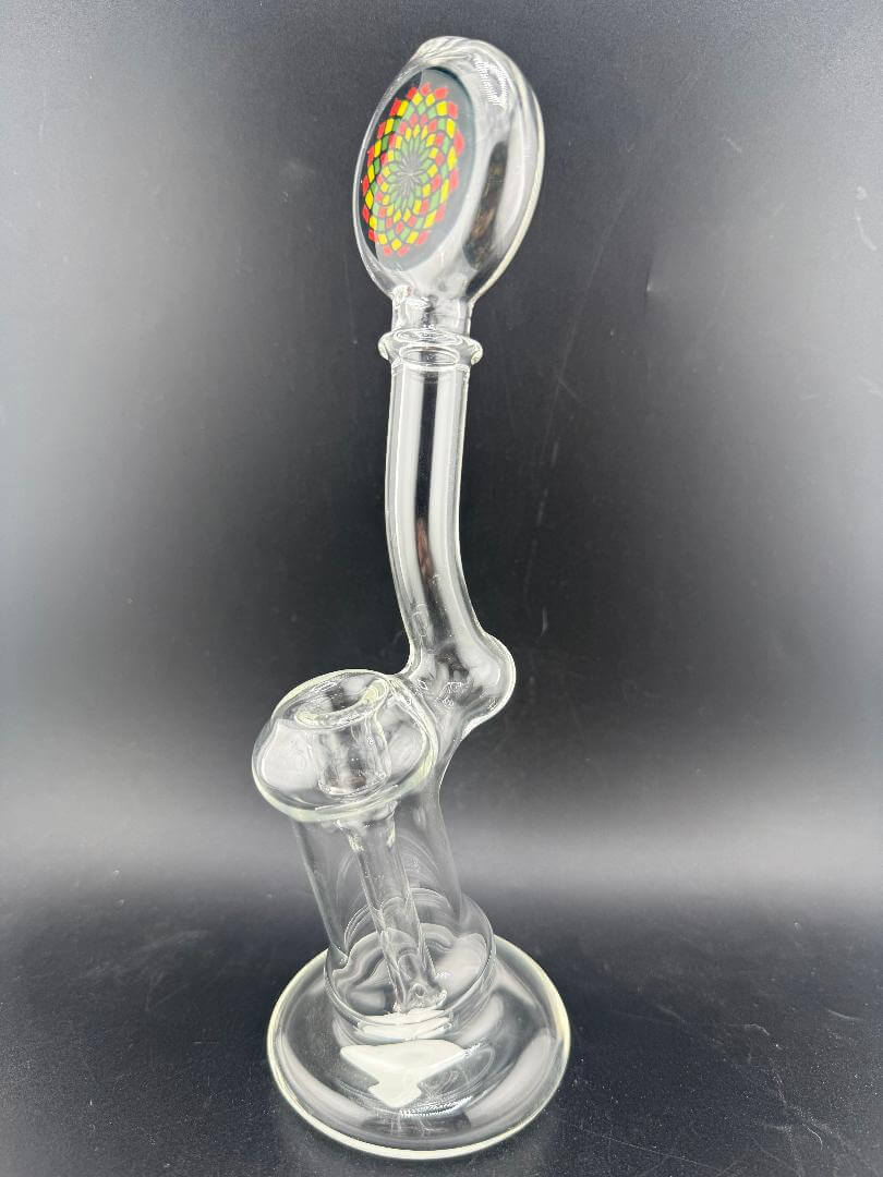 Filla John Glass Bubbler - Clear w/ Rasta Fillacello Mouth Piece 10mm showcasing clear borosilicate design and colorful mouthpiece.
