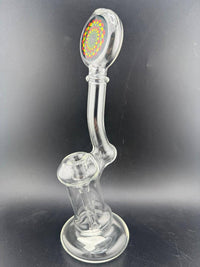 Filla John Glass Bubbler - Clear w/ Rasta Fillacello Mouth Piece 10mm showcasing clear borosilicate design and colorful mouthpiece.