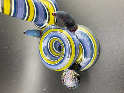 Filla John Glass Bubbler - Purple & yellow Line Worked w/ Horn & Dichro Marble Attachment close-up view.