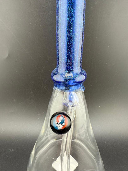 Filla John Glass Dichro Neck Single Color Beaker 10mm 45° with vibrant blue neck and decorative marbles.