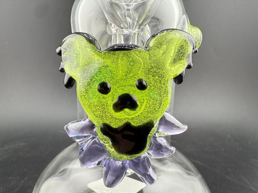 Filla John Glass Flower Bubbler - Line Worked Mouth Piece w/ Sculpted Grateful Dead Bear Pendant featuring a vibrant bear design.