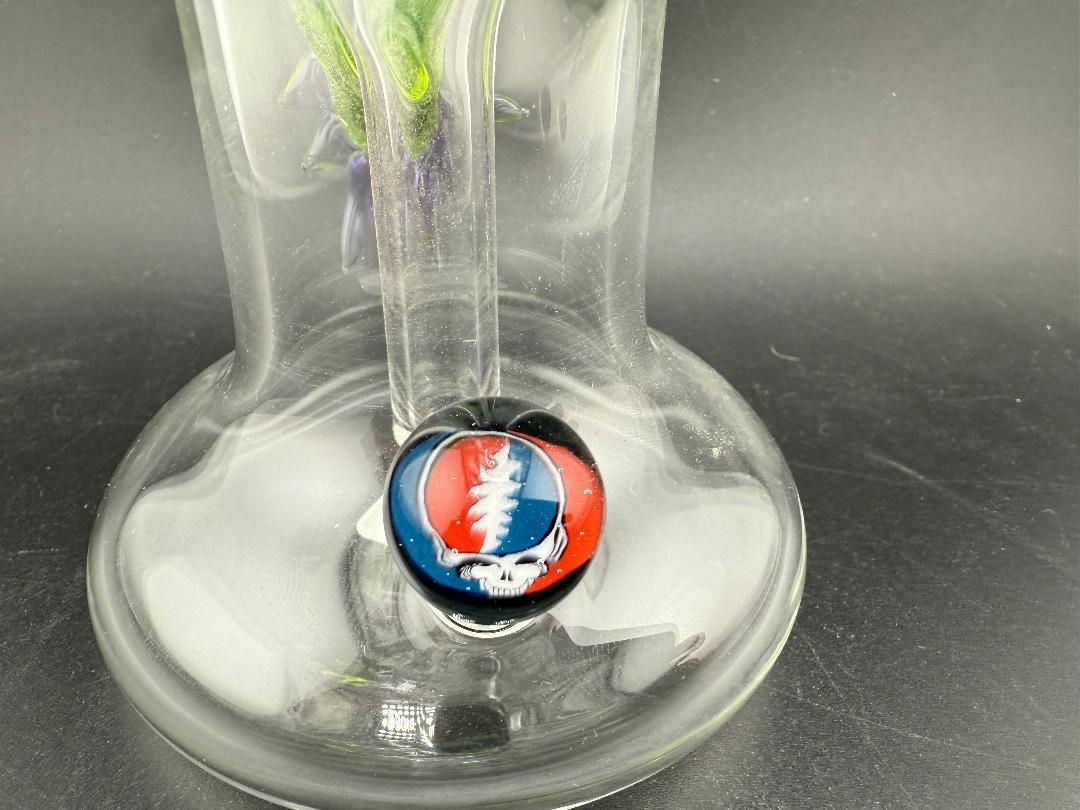 Filla John Glass Flower Bubbler - Line Worked Mouth Piece w/ Sculpted Grateful Dead Bear Pendant close-up detail