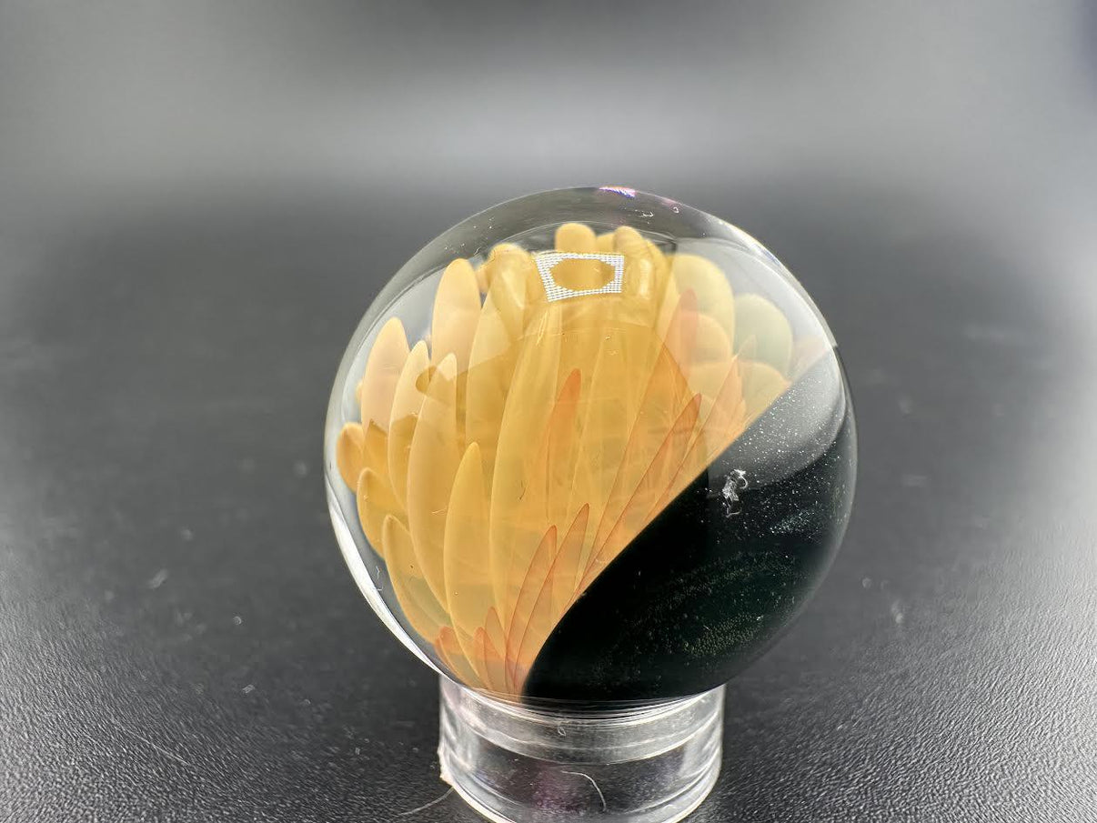 Filla John Glass Fumed Marble showcasing intricate design and fume work in a handcrafted glass art piece.