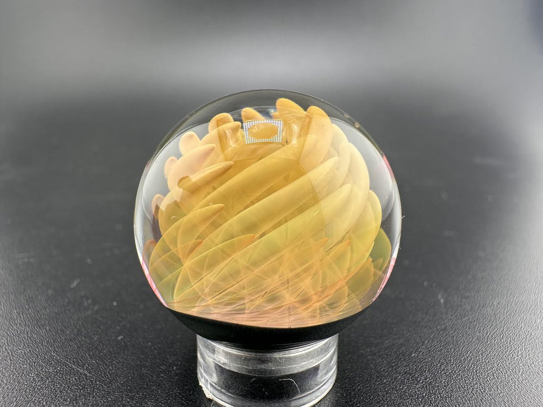 Filla John Glass Fumed Marble showcasing intricate design and fume work, handcrafted glass art from Nikk Drips, Idaho.