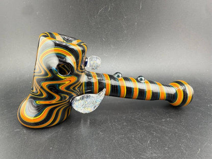 Filla John Glass Hammer Pipe - Orange & Black Line Worked w/ Dichro Attachments showcasing vibrant line work and details.