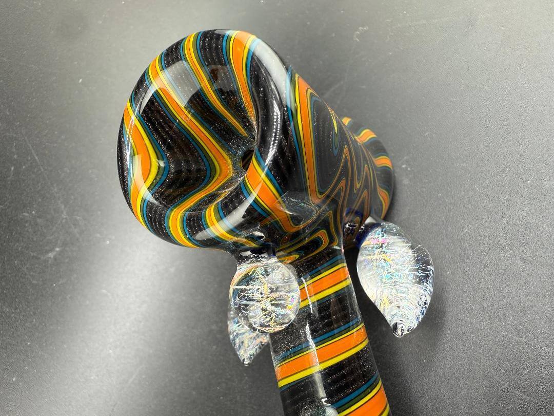 Filla John Glass Hammer Pipe - Orange & Black Line Worked w/ Dichro Attachments featuring bold colors and unique design.