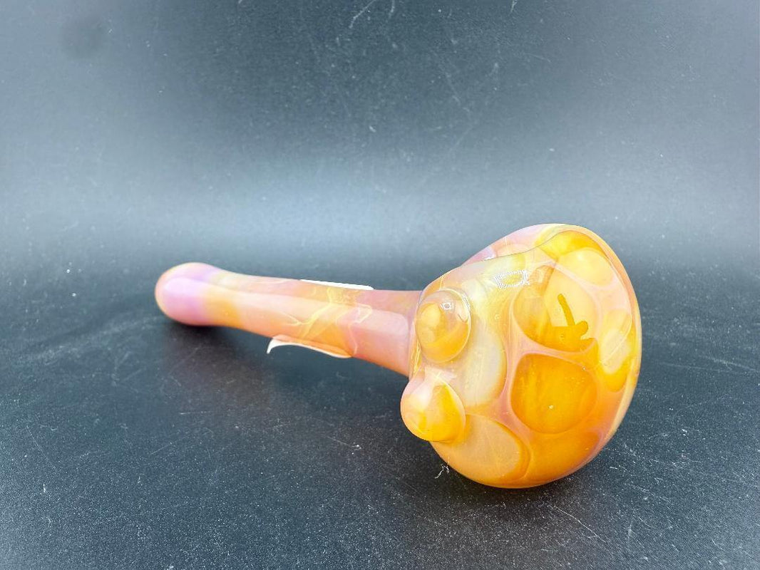 Filla John Glass Hand Pipe - Amber Honeycomb featuring a rich amber honeycomb design and compact shape.