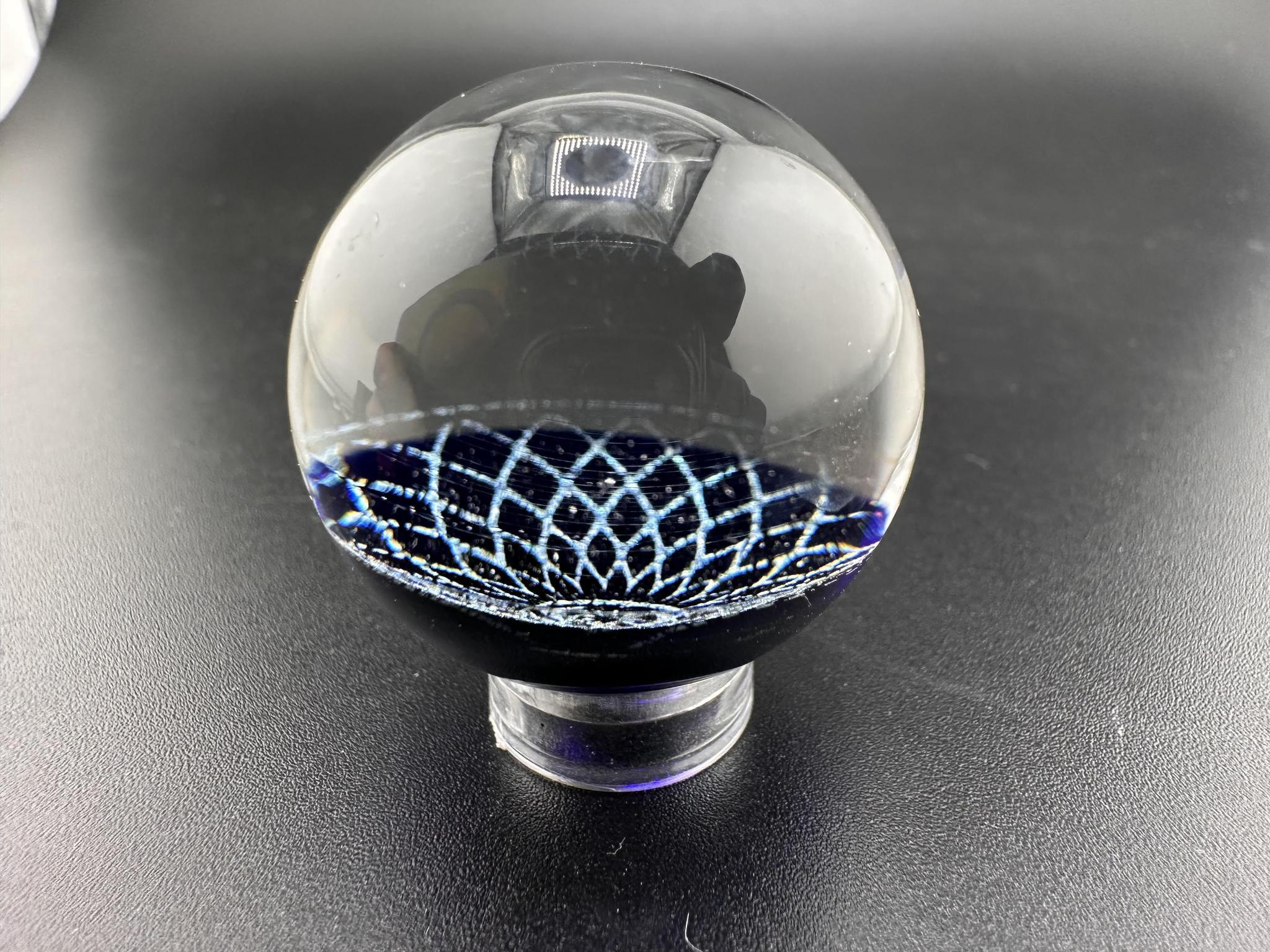 Filla John Glass Marble - Dichroic Sacred Geometry showcasing intricate designs in vibrant glass.