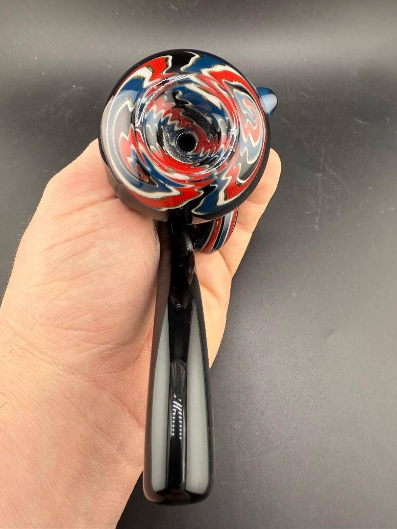 Filla John Glass Sherlock Pipe -Black w/ Red White & Blue Bowl Section & Pendant Attachment held in hand.