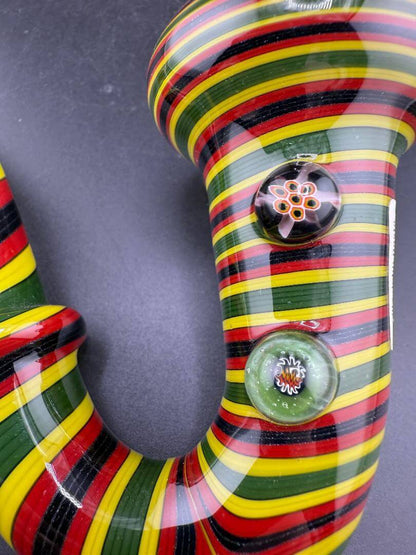 Filla John Glass Sherlock Pipe - Rasta Line Worked w/ Millie Attachments showcasing vibrant colors and intricate designs.